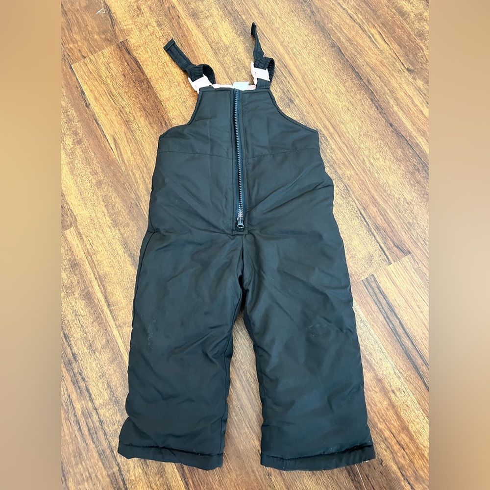 Carters 2T gently used snow pants. Black on the outside and light pink inside.